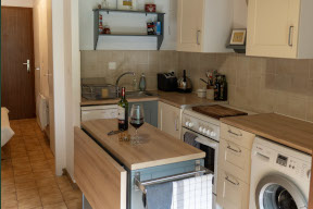 Kitchen island with single dropleaf